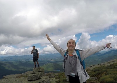 Happy student atop High Peak