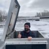 A man in an open hatch