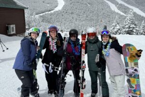 Students at Whiteface Mountain dressed in skiing gear.