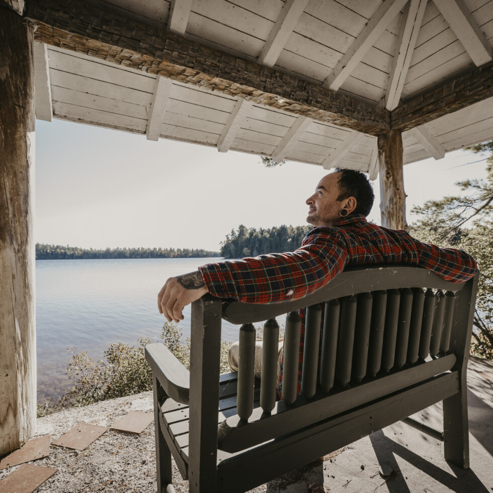 A person sitting on a bench