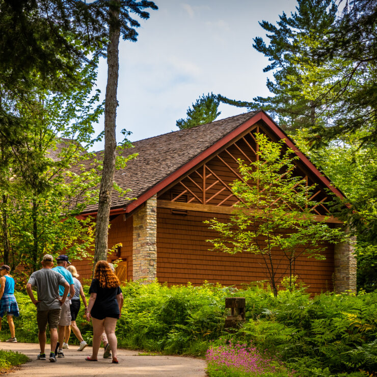 People walking toward a building