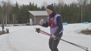A man with ski poles
