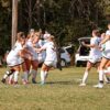 A group of soccer players celebrating