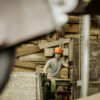 A person using a sawmill