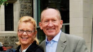 Two people smiling